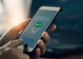 Man using mobile smart phone, online payment, banking and online shopping at home. Business and technology.